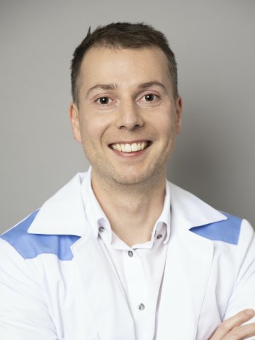 Dr. Fehér György